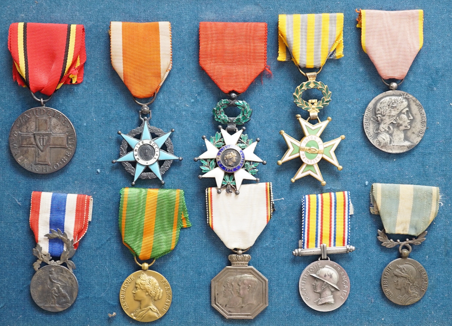 Eighteen French medals, including The War Cross, TOE French Legion Cross, Medal of Honour, Croix du Combatant Medal, WWI Commemorative Medal, 1870 Military Medal, 1914-18 Victory Medal, etc.